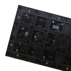 Black circuit board featuring multiple integrated circuits and connectors arranged in a grid pattern.