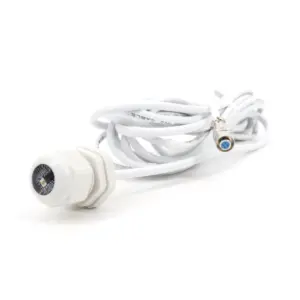 White cable with a connector and a mounting base for electronic devices.