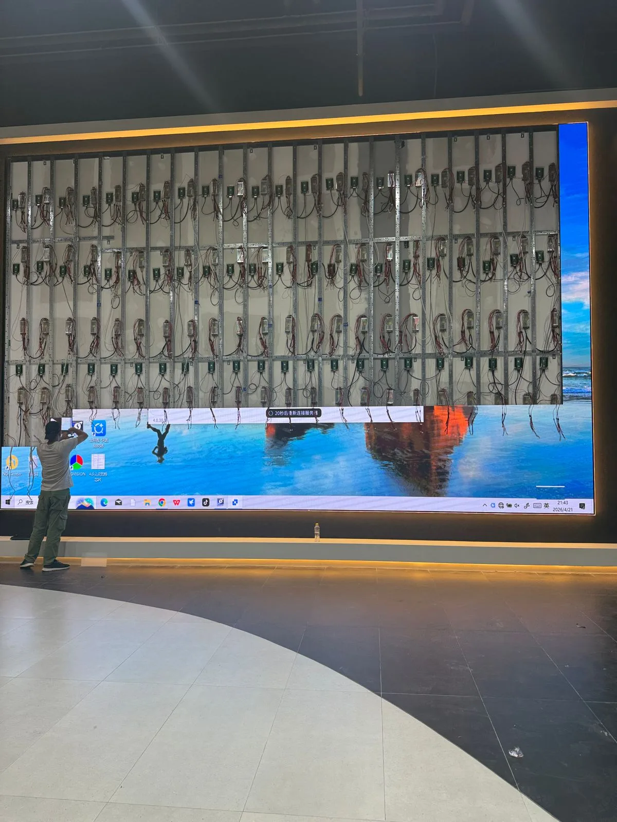 LED video wall maintenance - technician repairing modules