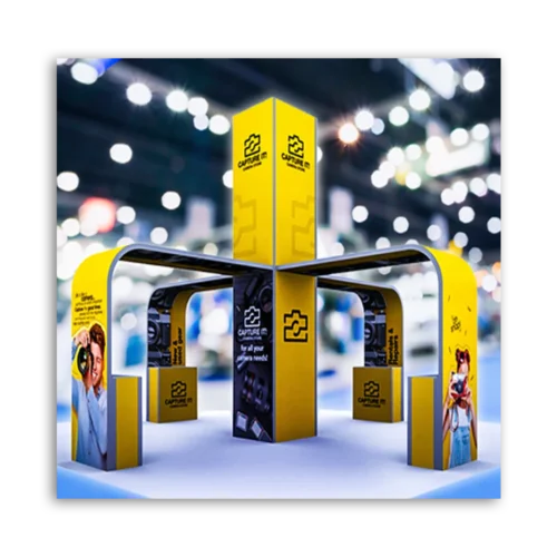 Exhibition booth for Capture featuring bright yellow design and promotional graphics.