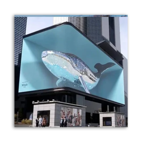 Digital billboard displaying a large whale image in a blue background in an urban setting.